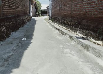 Diduga Bangunan Jalan Lingkungan Lama Tapi Muncul Papan Anggaran Baru.